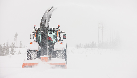 valtra tractor and twintrac in winter